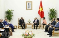 pm looks to maintain high level visits between vietnam laos