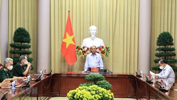 President Nguyen Xuan Phuc affirms policies towards revolution contributors, AO victims