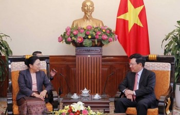 Deputy PM Pham Binh Minh hosts Lao Deputy FM