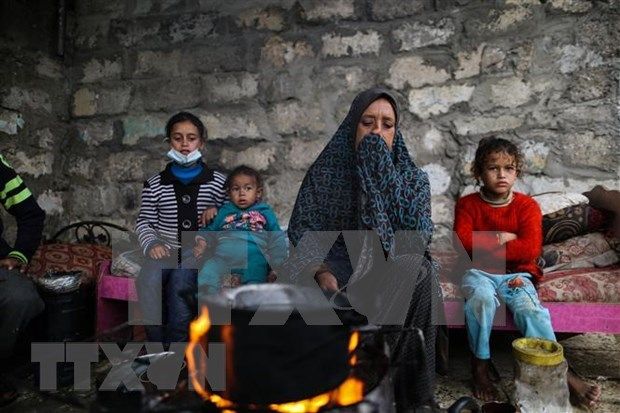 Palestinian people at a refugee camp in Khan Younis City, Gaza Strip on November 26, 2020. (Photo: Xinhua/VNA)