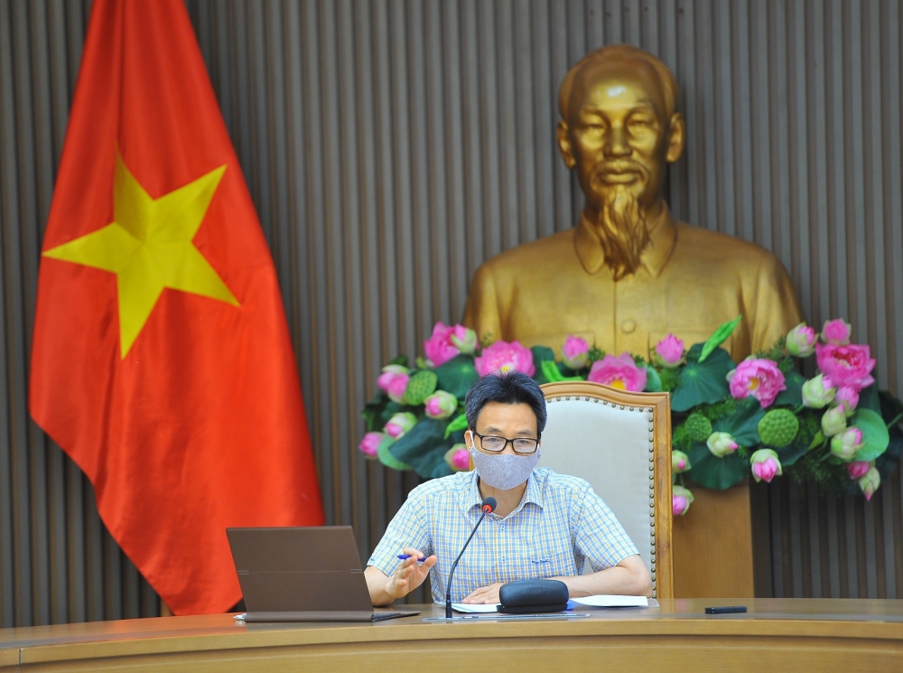 Phó Thủ tướng Chính phủ Vũ Đức Đam, Trưởng Ban Chỉ đạo Quốc gia phòng, chống dịch COVID-19 chủ trì cuộc họp trực tuyến với tỉnh Bắc Ninh và Bắc Giang triển khai các biện pháp cấp bách để khống chế dịch bệnh Covid-19. chiều ngày 30/5. (Nguồn: TTXVN)