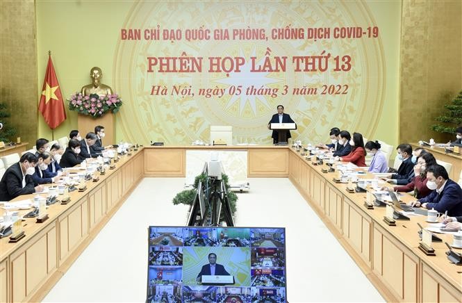 Prime Minister Pham Minh Chinh chairs teleconference between the National Steering Committee for COVID-19 Prevention and Control with ministries, sectors, and 63 provinces and cities (Photo: VNA)