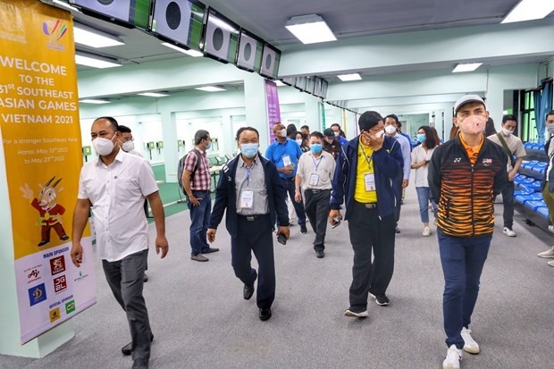 Sport delegations of Southeast Asian nations tours the venue for shooting at SEA Games 31. (Photo: VNA)