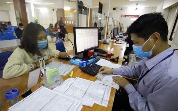 Vietnam Social Security’s digital transformation efforts have helped provide chip-based ID cards for health insurance at more than 4,000 medical facilities across the country. (Photo: VNA)