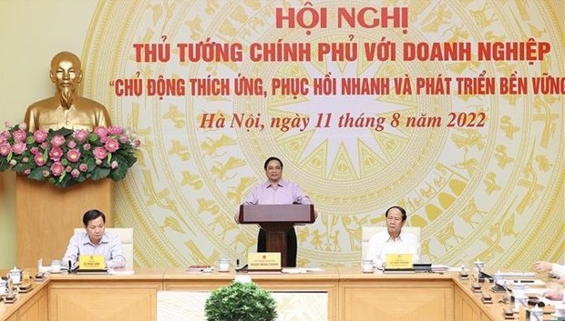 Prime Minister Pham Minh Chinh presides over the Government to Business conference on August 11. (Source: VNA)