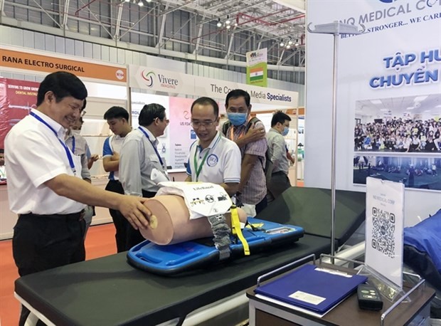 Visitors to the 20th International Medical, Hospital & Pharmaceutical Exhibition that opened on August 11 in HCM City. (Source: VNA)