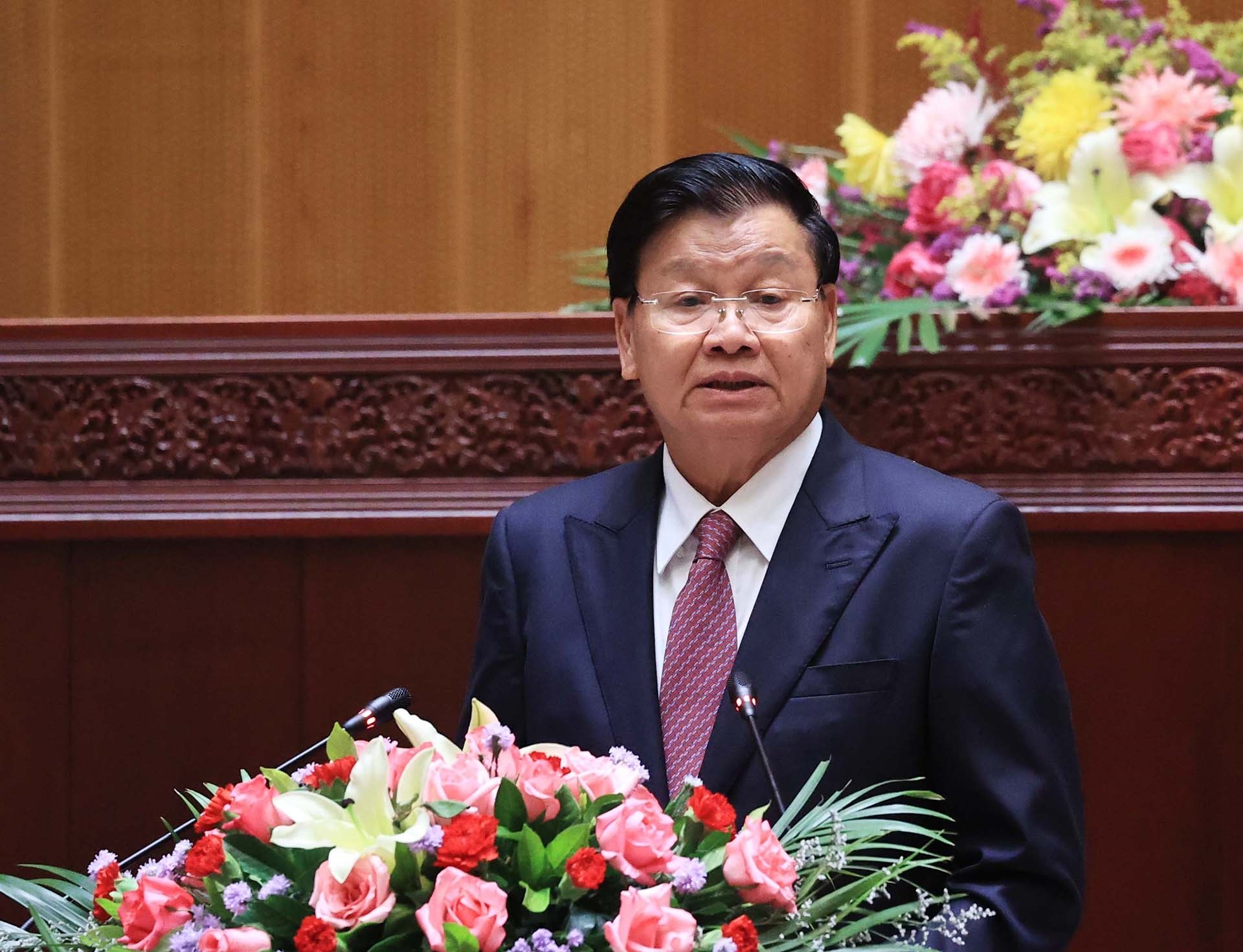 Tổng Bí thư, Chủ tịch nước Lào Thongloun Sisoulith phát biểu tại buổi lễ. (Nguồn: TTXVN)
