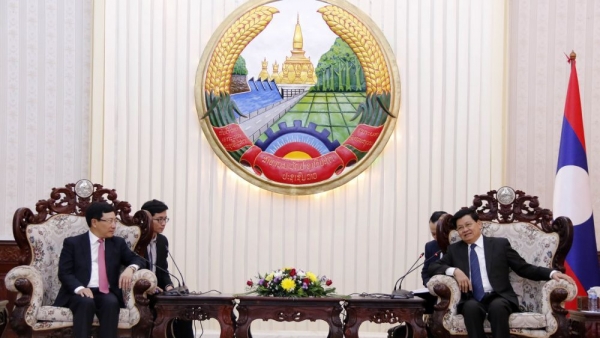 Deputy Prime Minister Pham Binh Minh meets Lao top leaders