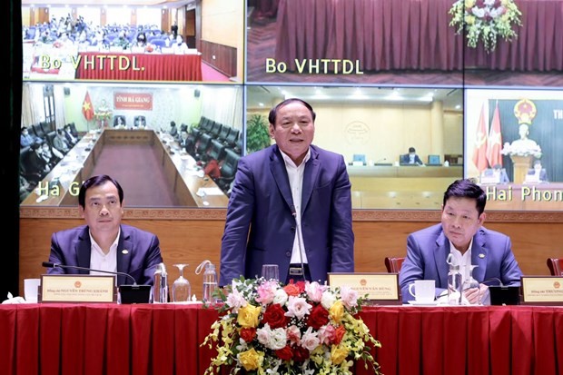 Minister of Culture, Sports and Tourism Nguyen Van Hung speaks at the workshop on January 24. (Photo: VNA)