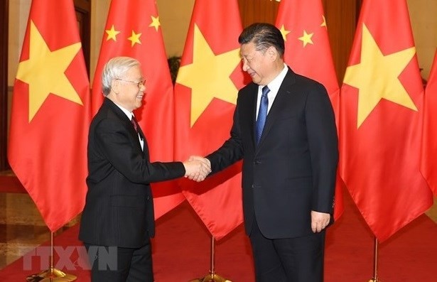 Party General Secretary Nguyen Phu Trong (left) and Chinese Party General Secretary and President of China Xi Jinping. (Photo: VNA)