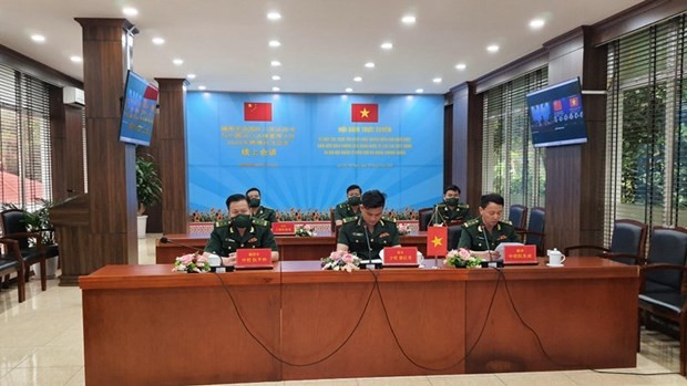 Border guards of the northern province of Lao Cai at the online talks. (Photo: baophapluat.vn)