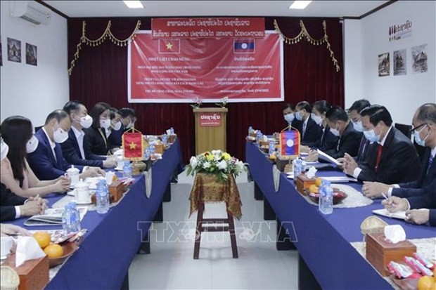 Party information-education commission leader busy in Laos