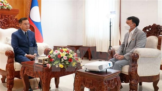 Chairman of the Lao NA Saysomphone Phomvihane (L) in the interview. (Photo: VNA)