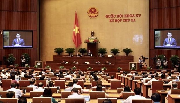 National Assembly Chairman Vuong Dinh Hue chairs the Q&A session. (Photo: VNA) 