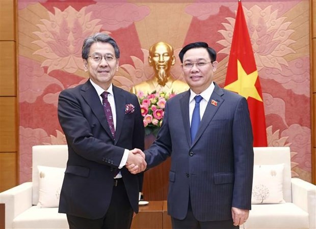 Chairman of the National Assembly Vuong Dinh Hue meets the visiting Governor of Japan Bank for International Cooperation (JBIC), Maeda Tadashi, in Hanoi on July 22. (Photo: VNA)