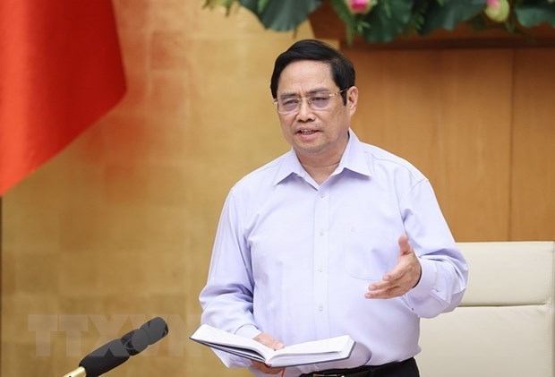 Prime Minister Pham Minh Chinh addresses the teleconference on August 29 (Photo: VNA)