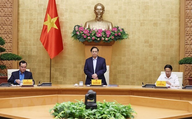 Prime Minister Pham Minh Chinh chairs the meeting on October 16. (Photo: VNA)