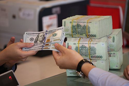 Reference exchange rate revised up by 13 VND