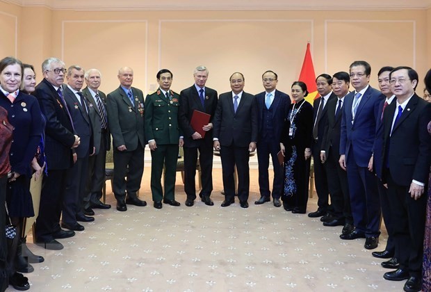 President Nguyen Xuan Phuc meets representatives of the Russia-Viet Nam Friendship Association and the Association of Russian Veterans in Viet Nam on December 2 . (Photo: VNA)