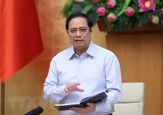 Prime Minister Pham Minh Chinh chairs the meeting of the Central Emulation and Rewards Council in Hanoi on August 14 (Source: VNA)