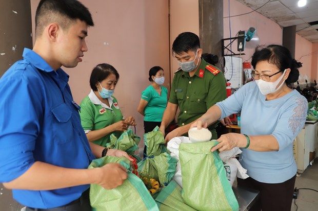 hcm city residents swap trash for rice in fight against plastics