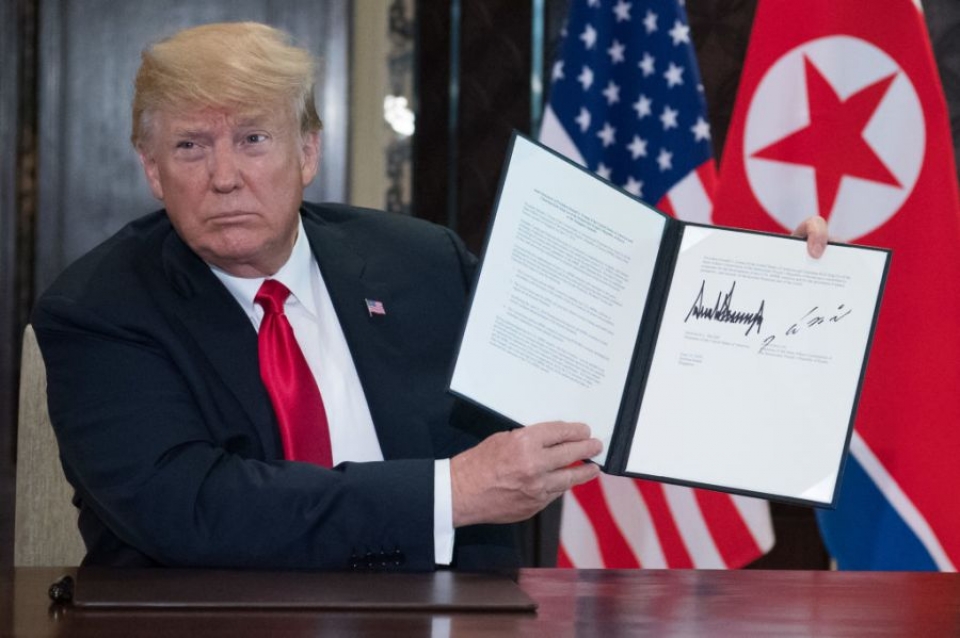 trump kim sign agreement after historic summit but few specifics