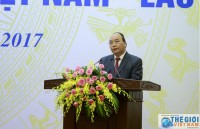 pm lauds vietnam laos cooperation in home affairs