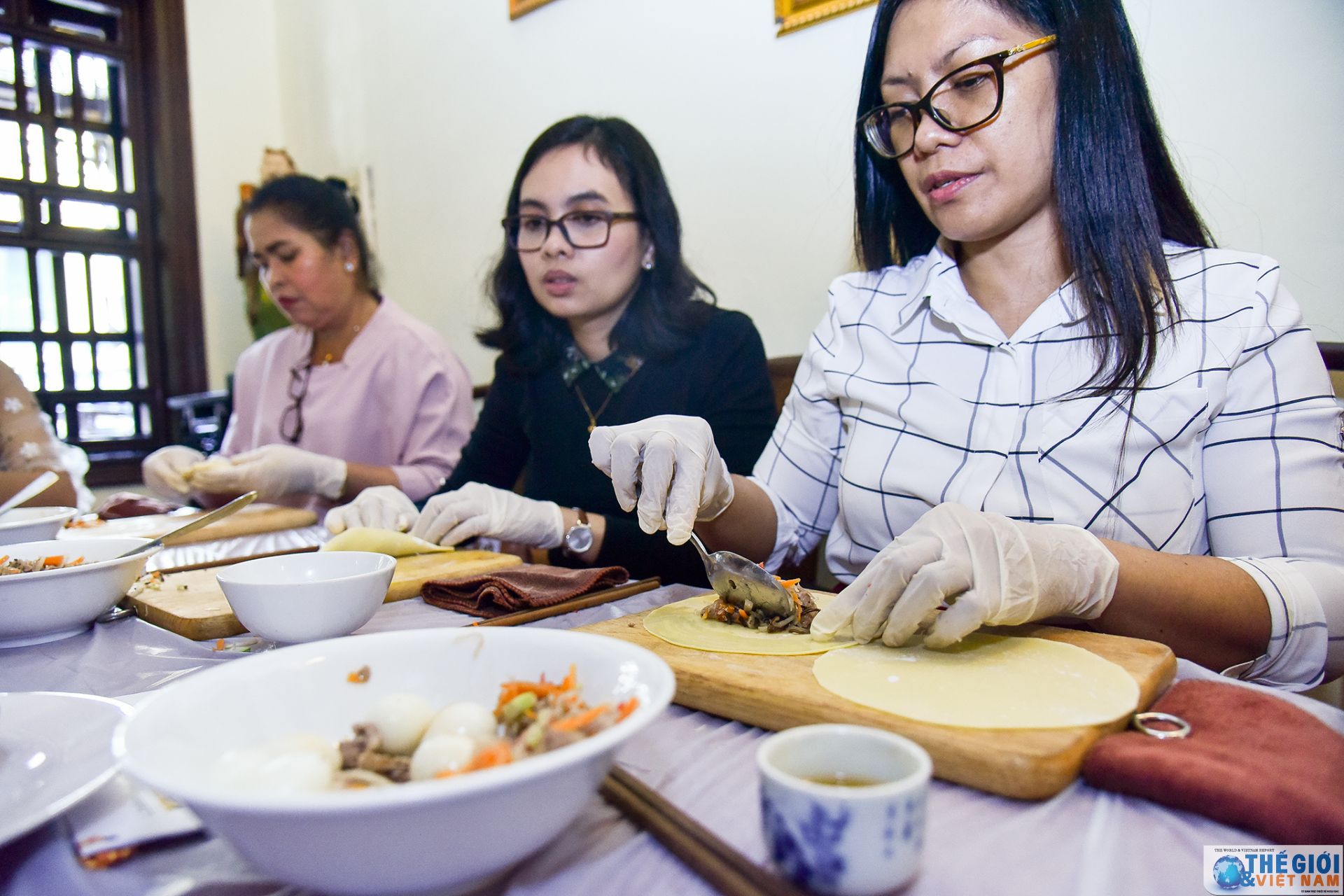the asean womens circle of ha noi experiences making traditional vietnamese dishes