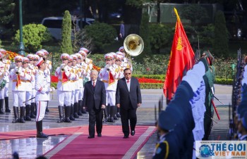 Grand welcome ceremony for Lao leader in Ha Noi