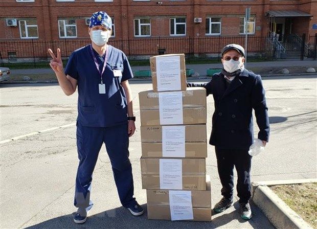 vietnamese communities in russia czech republic join local efforts against covid 19 outbreak