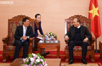 PM Nguyen Xuan Phuc hails Vietnam-Laos banking cooperation