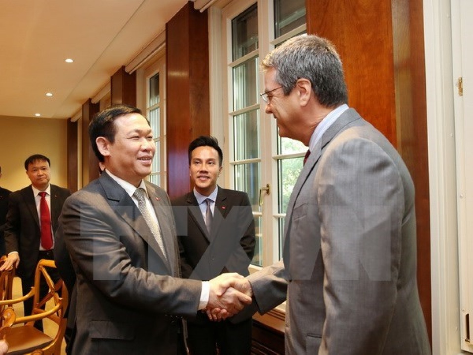 deputy pm vuong dinh hue meets wto leaders