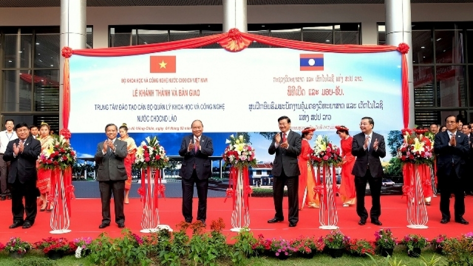 vietnamese lao pms attend training centres inaugural ceremony