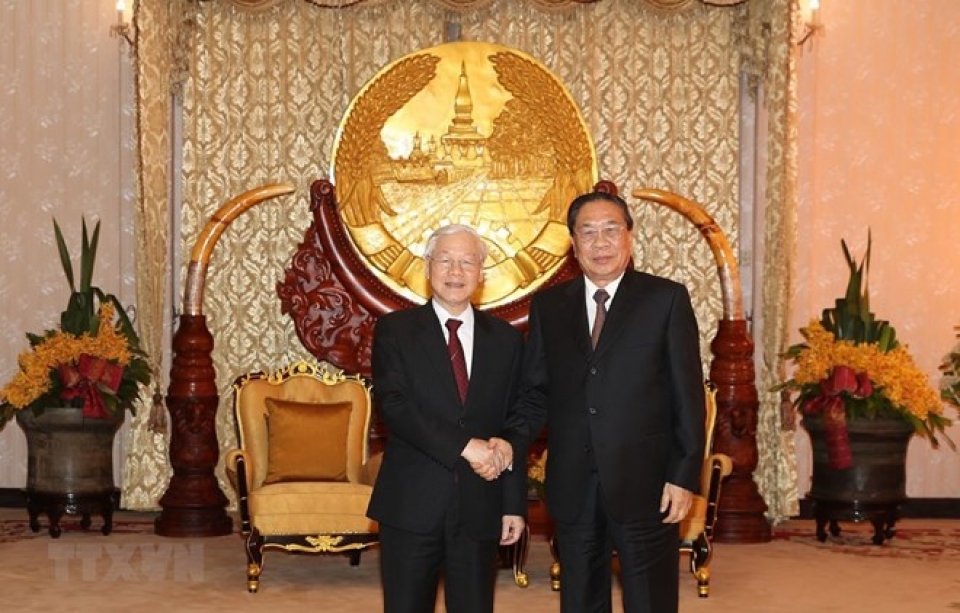 party general secretary president meets former leader of laos