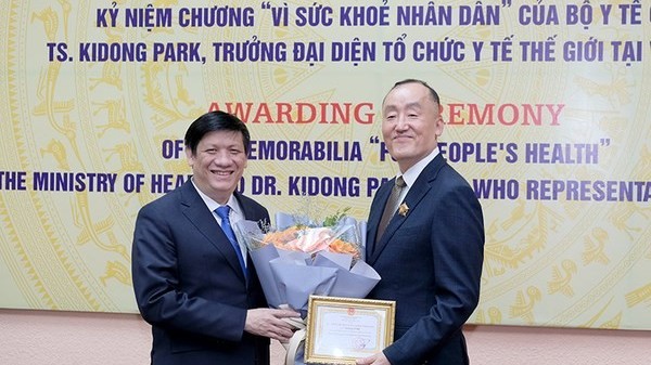 WHO Representative Dr Kidong Park honoured with insignia