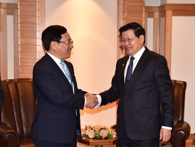 deputy pm pham binh minh meets japanese lao leaders in tokyo