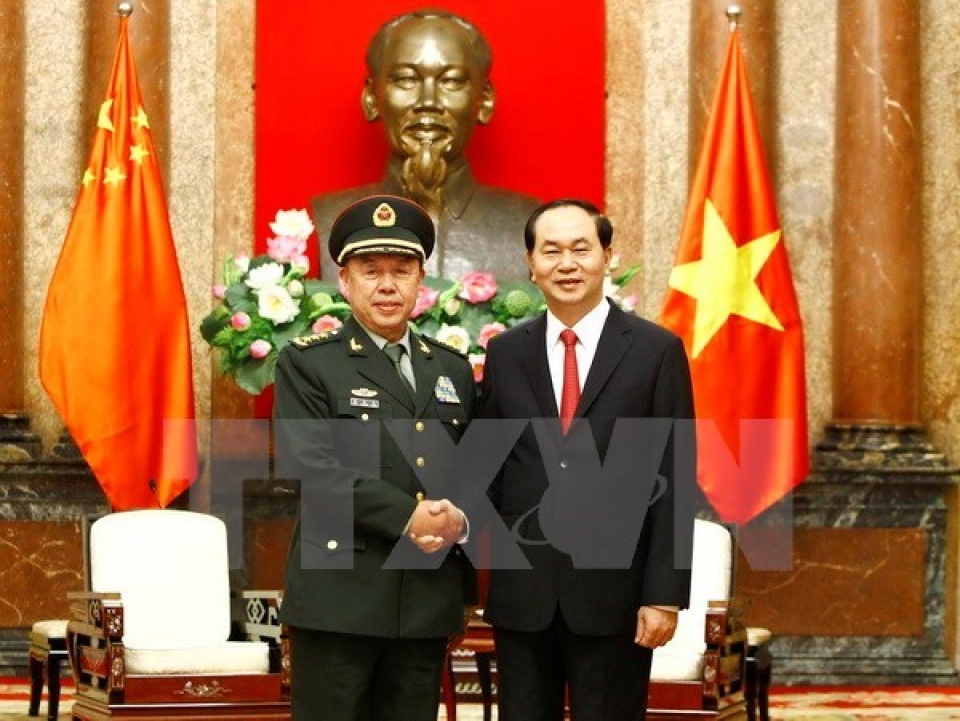 president tran dai quang welcomes chinese senior officer