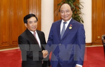 PM Nguyen Xuan Phuc pledges continuous support for Laos’s nation building