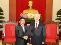 pm nguyen xuan phuc pledges continuous support for laoss nation building