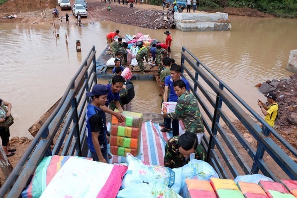 more aid from vietnam reaches survivors of lao dam collapse
