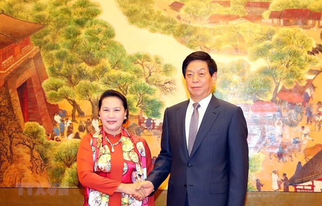 na chairwoman holds talks with chinese national peoples congress leader