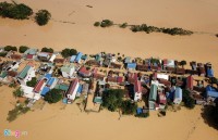 vietnam races to deal with flood impacts and braces for typhoon