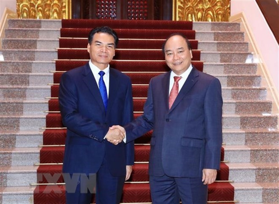 pm nguyen xuan phuc hosts head of lao government office
