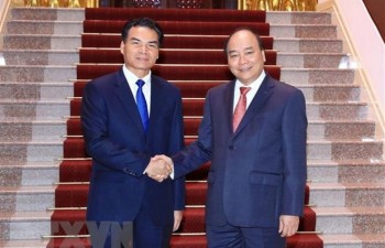 PM Nguyen Xuan Phuc hosts head of Lao Government Office