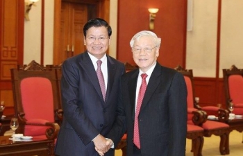 Top leader welcomes Lao PM in Ha Noi