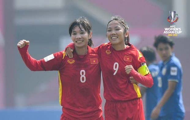 Members of the national women's football team celebrate their goal (Photo: VNA)