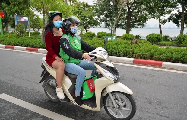Motorbike taxi services have been allowed to resume operations in Hanoi after a six-month hiatus to slow the spread of COVID-19. (Photo: VNA)