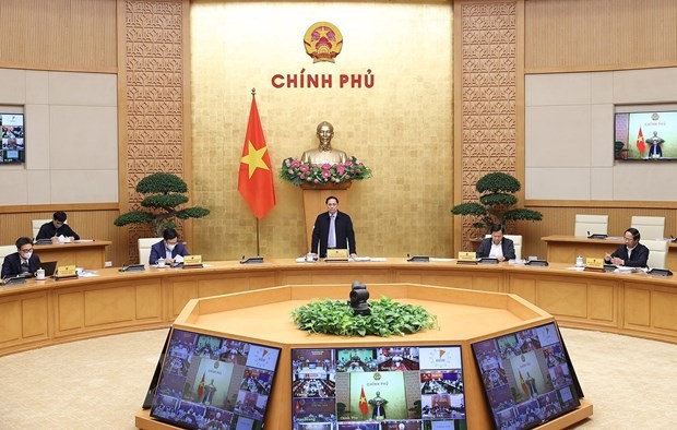 Prime Minister Pham Minh Chinh was at the meeting. (Photo: VNA)