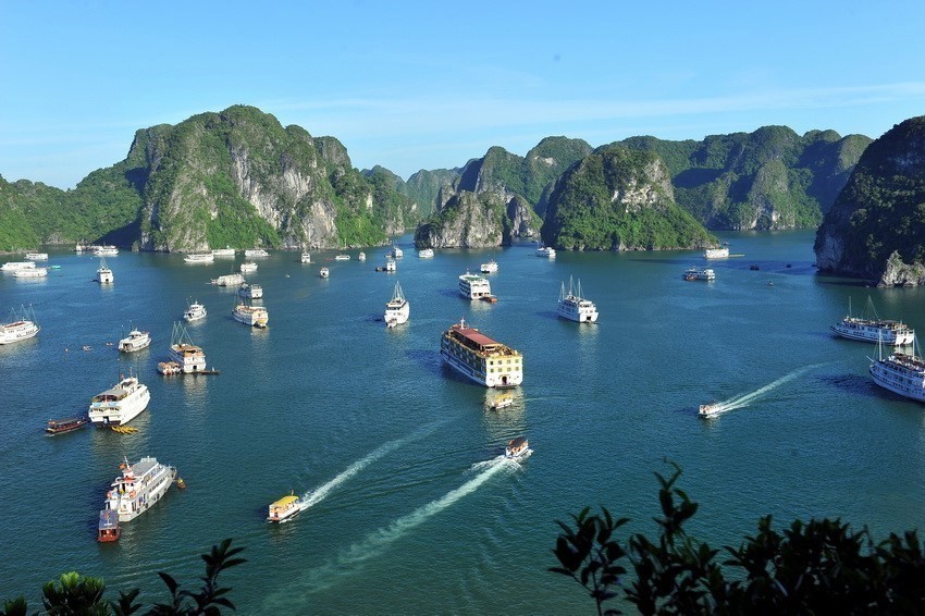 Boats take visitors through the unique beauty of Ha Long Bay. (Photo: VNA)