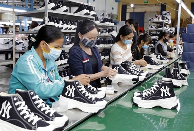 Workers in HCM City make shoes for export to the EU market last year. (Photo: VNA)